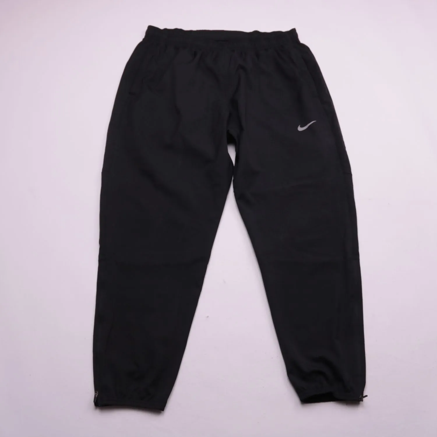 Чёрные спортивные брюки Nike с молниями, размер 54 (XL)